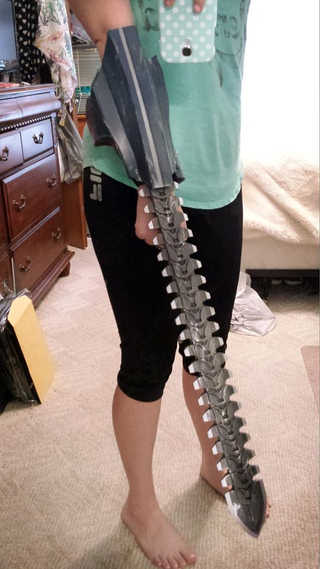 Illustration for article titled Lady Gipsy Danger Cosplay From Pacific Rim Has Her Own Robot Sword